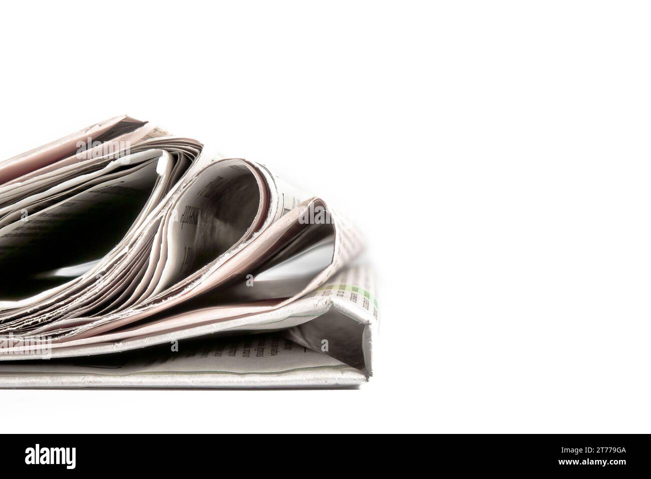 stack of financial newspapers with space for text on white background Stock Photo