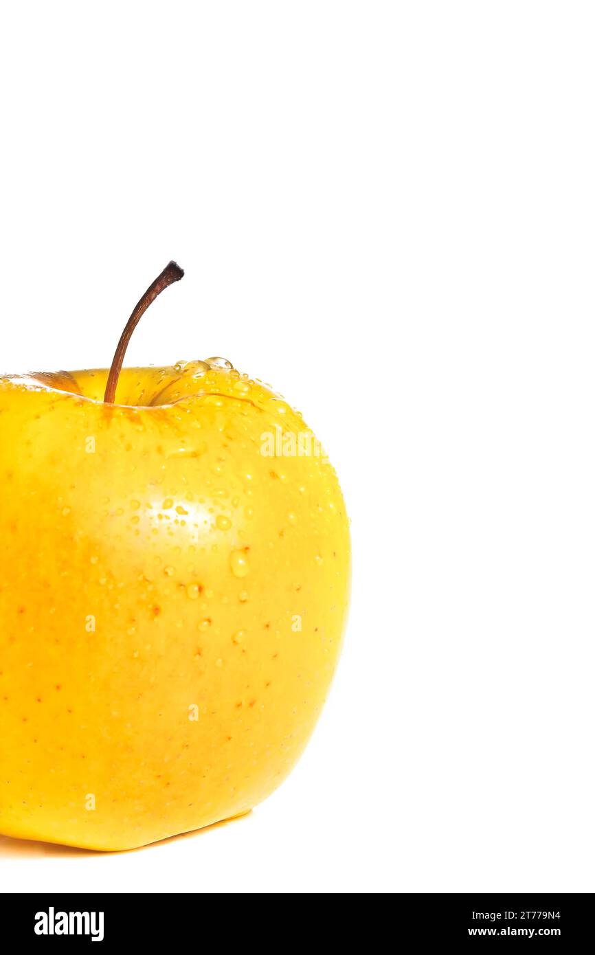 wet yellow delicious half apple with space for text on white background Stock Photo
