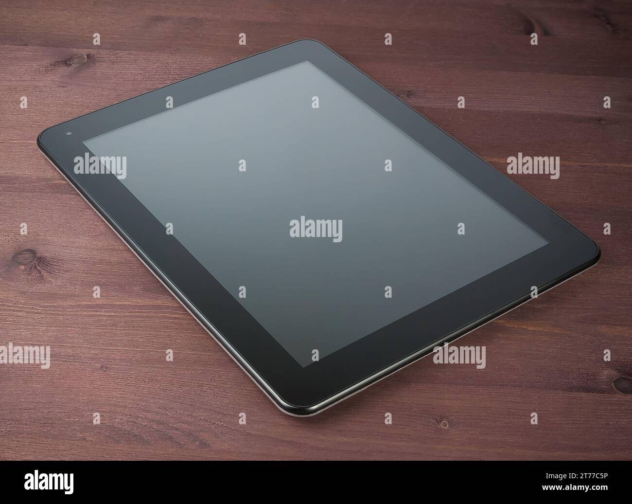 modern black tablet pc on old wood table with space for text Stock Photo