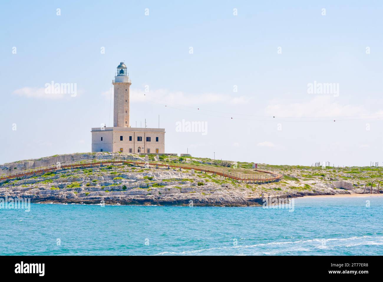a lighthouse in the beautiful sunny day with clouds in Vieste Italy Stock Photo