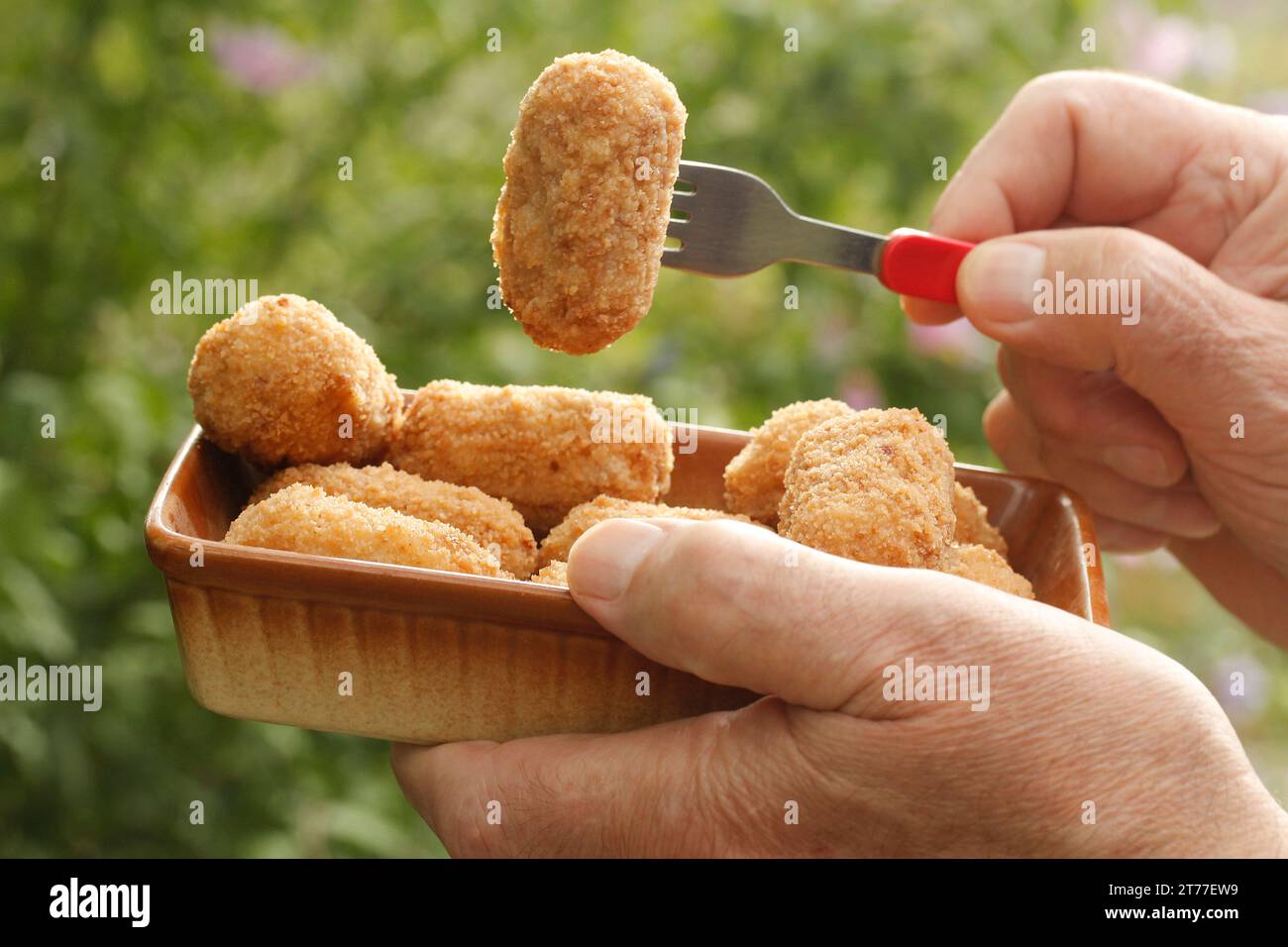 Croquettes hand hi-res stock photography and images - Alamy