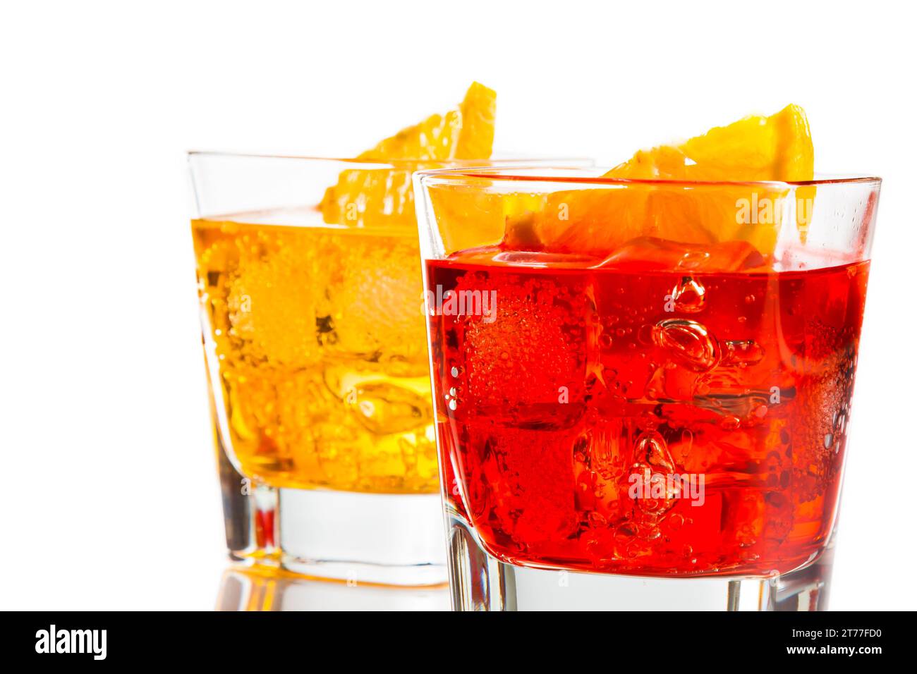 red and yellow cocktail with orange slice isolated on white background with space for text Stock Photo
