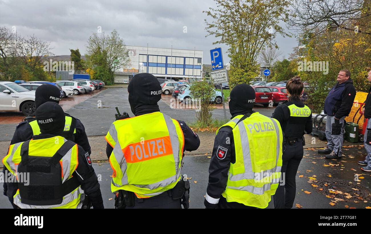 Salzgitter, Germany. 14th Nov, 2023. Police officers cordon off a