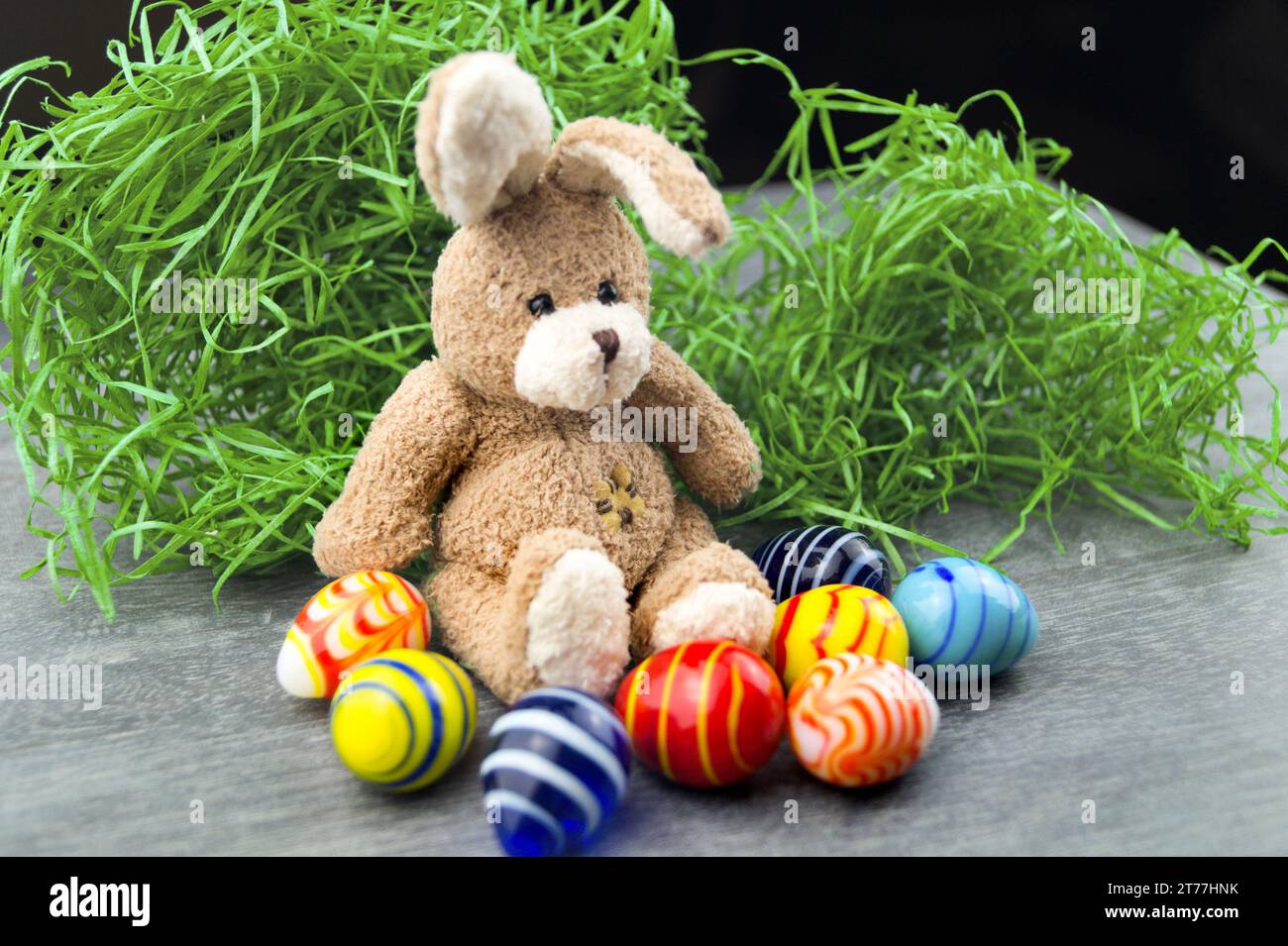 Easter bunny with Easter eggs in Easter nest Stock Photo