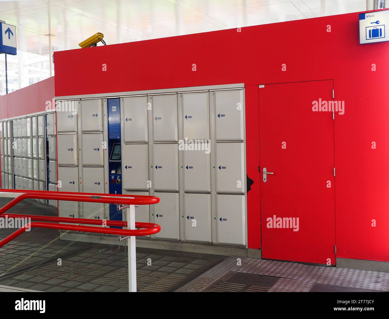 An electronic luggage locking system at a train station, luggage