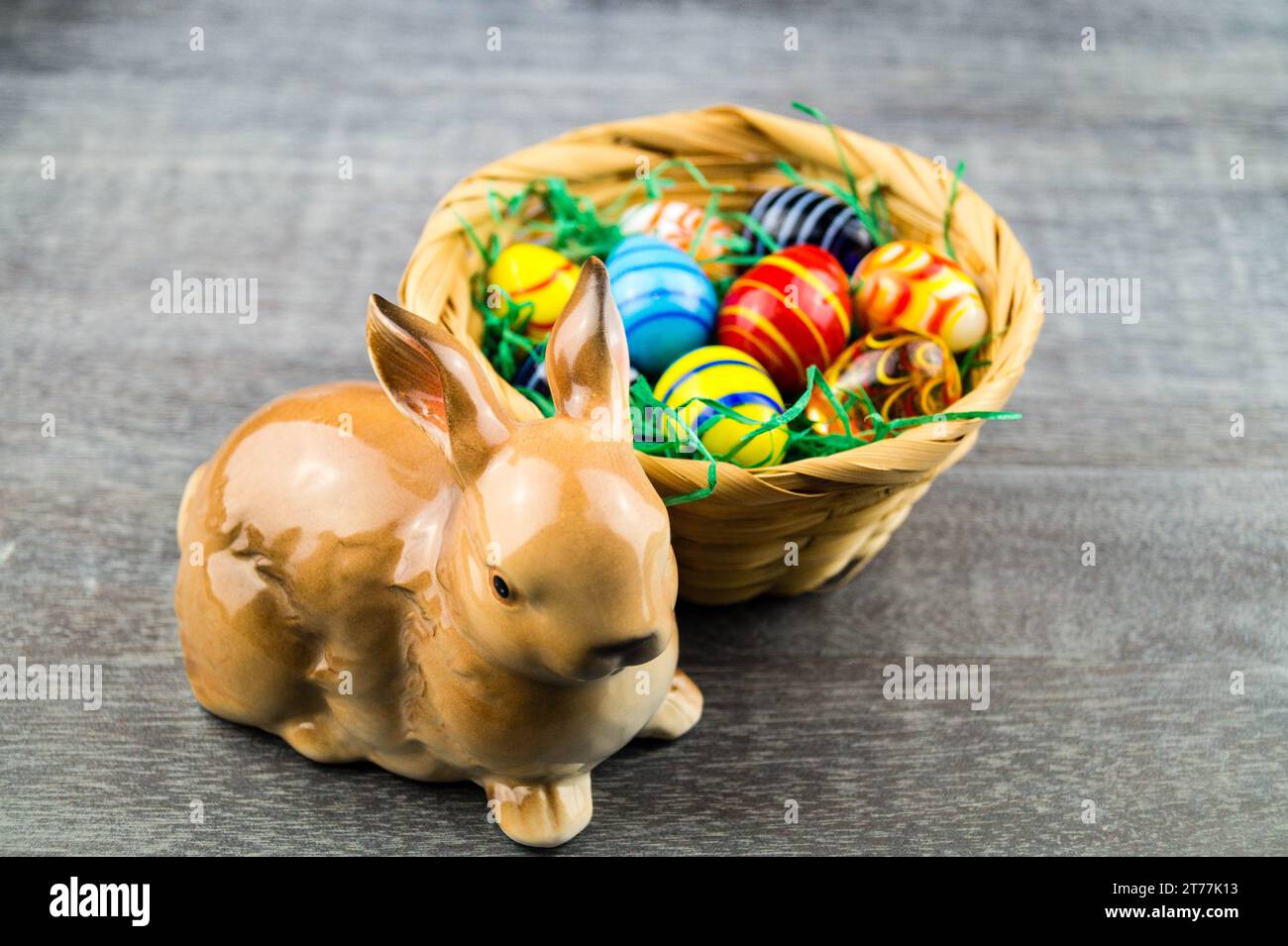 Easter bunny with Easter eggs in Easter nest Stock Photo