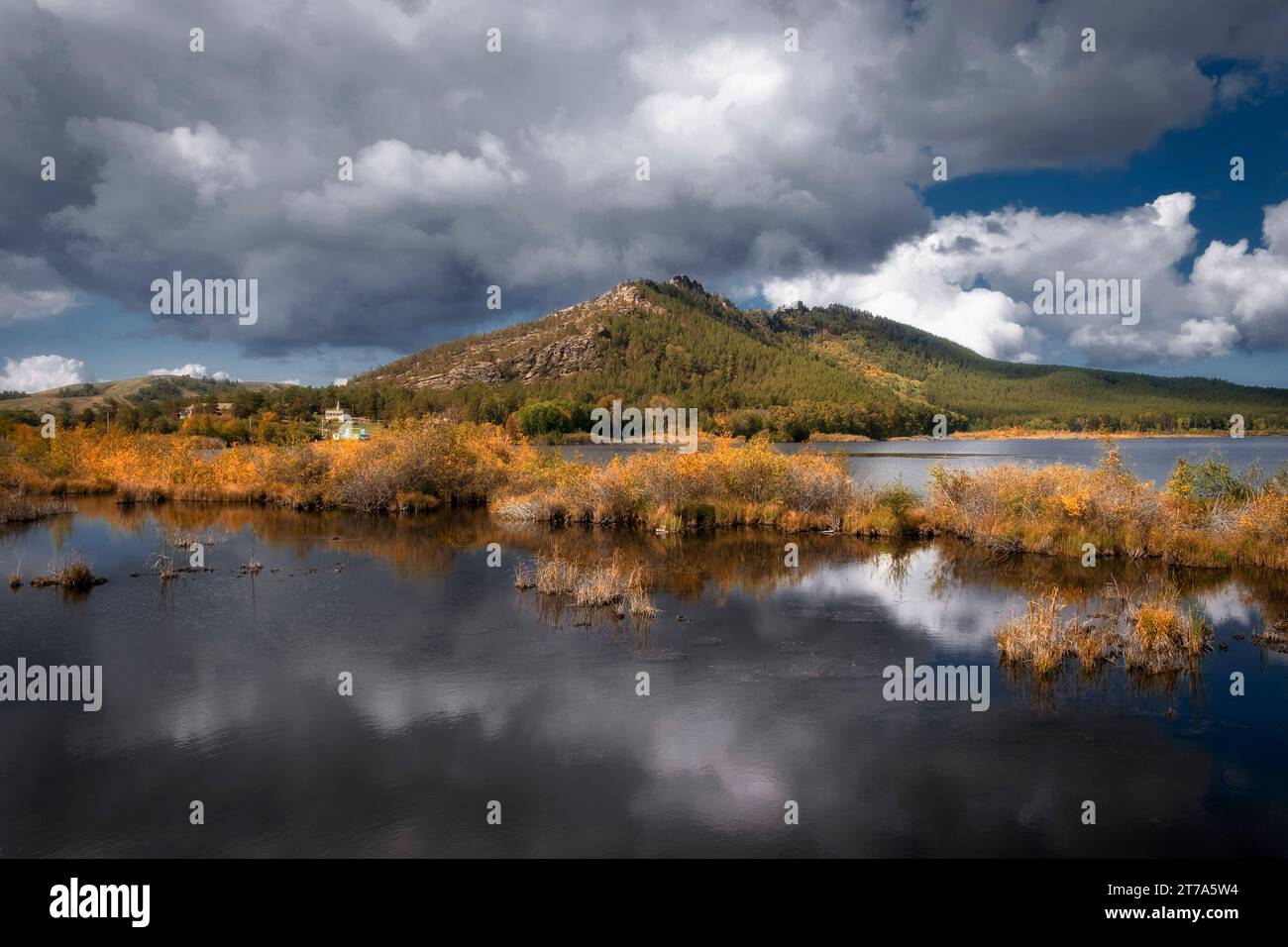 Pasheno Lake at the foot of Karkaraly Mountains in Kazakhstan on sunny autumn day Stock Photo
