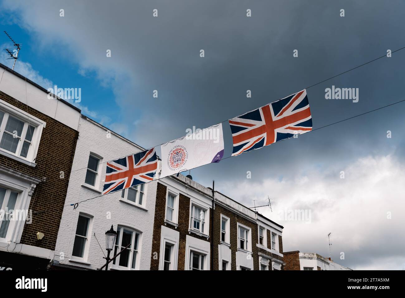 London, UK - August 26, 2023: United Kingdom flags across the street in Portobello Road in Notting Hill Stock Photo