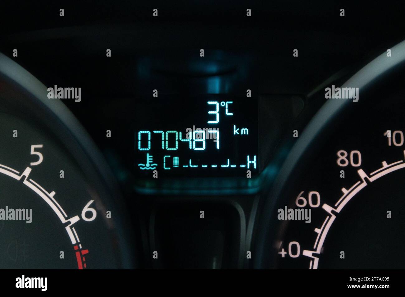 A closeup image of the interior dashboard of a car displaying the