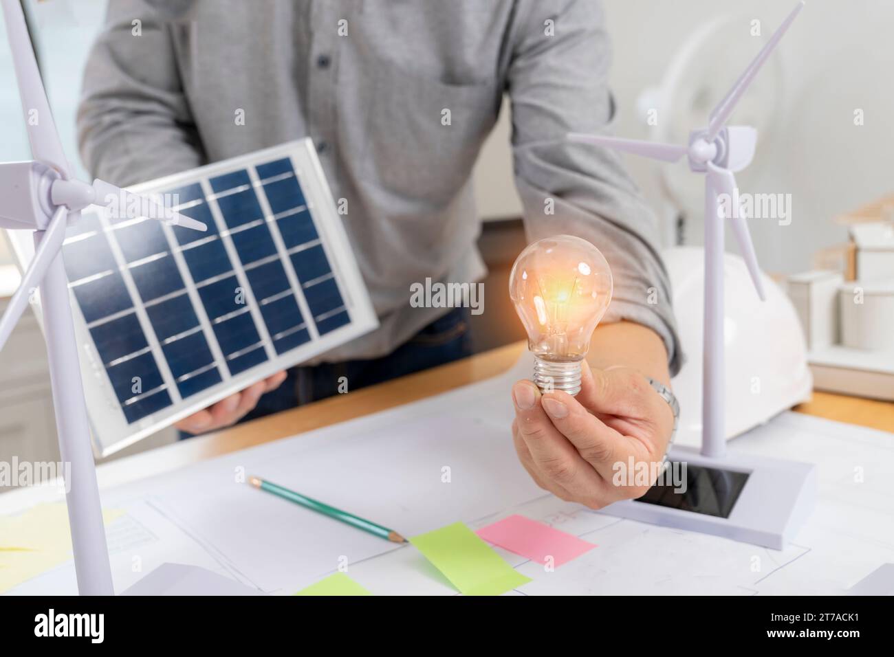 Architect working design apply renewable green energy Stock Photo - Alamy - Green Building Energy Design Skills