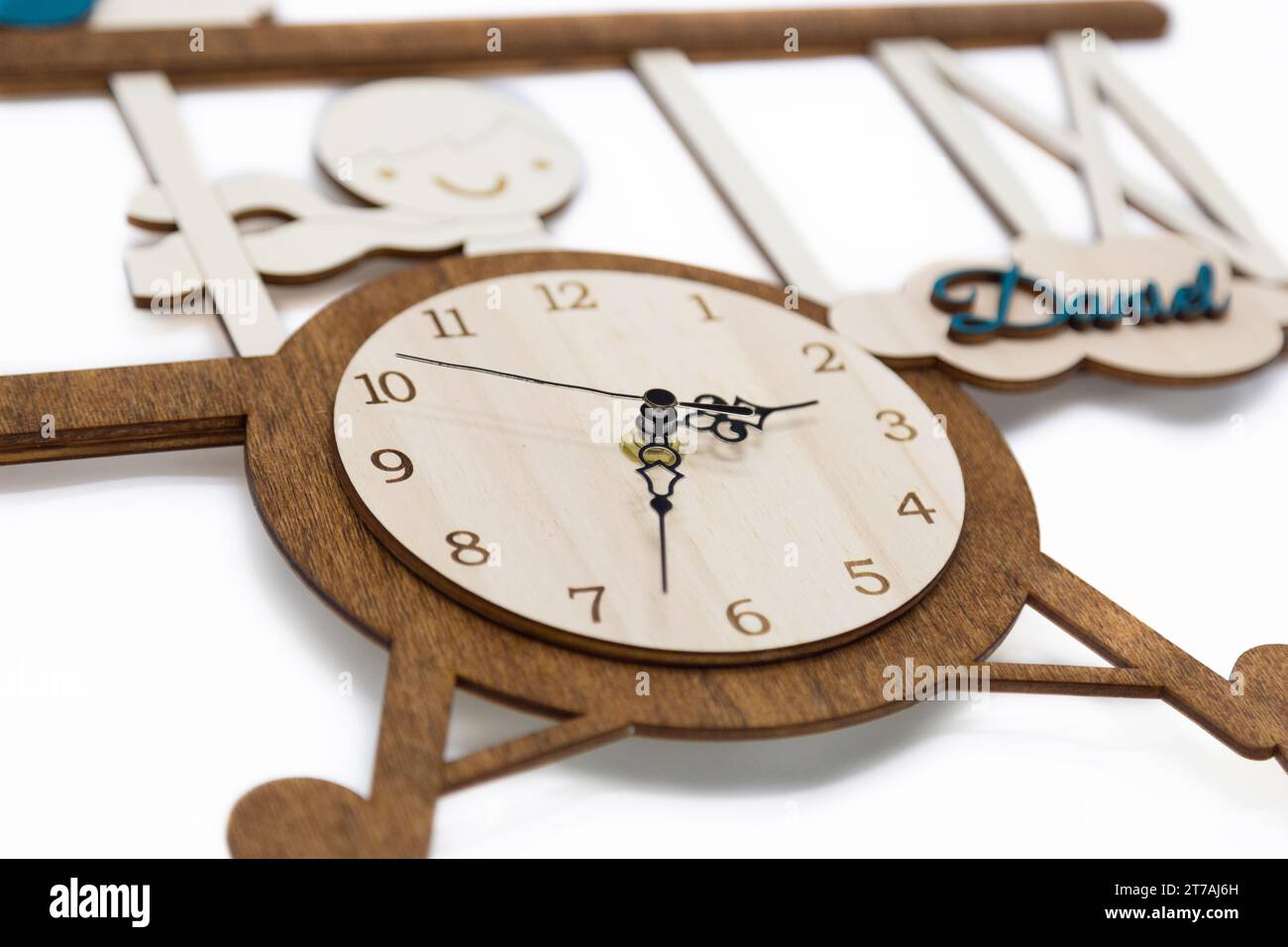 A wooden clock with the name David on a white background Stock Photo ...