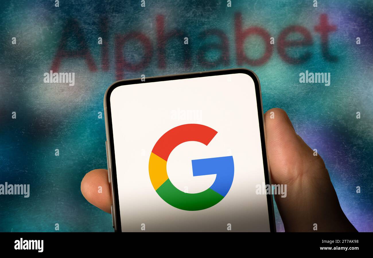Alphabet Inc. and Google logo displayed on a smartphone Stock Photo
