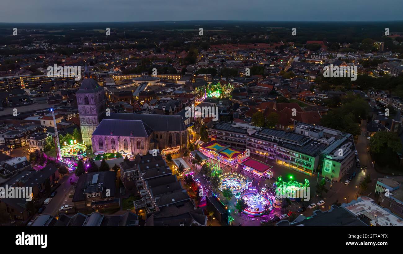OLDENZAAL, NETHERLANDS - SEPTEMBER 30, 2023: Aerial evening view of the annual fair in the city center Stock Photo