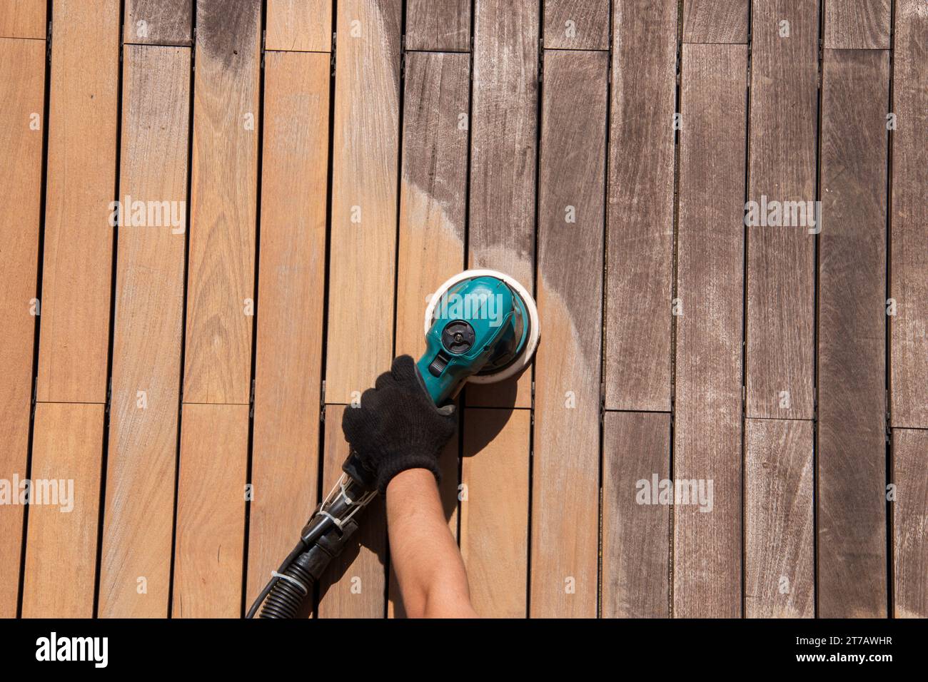 Ipe wood deck boards texture before and after sanding orbital power