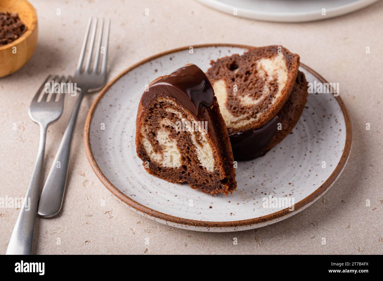 Marbled bundt cake sliced on a plate, chocolate and vanilla cake Stock Photo