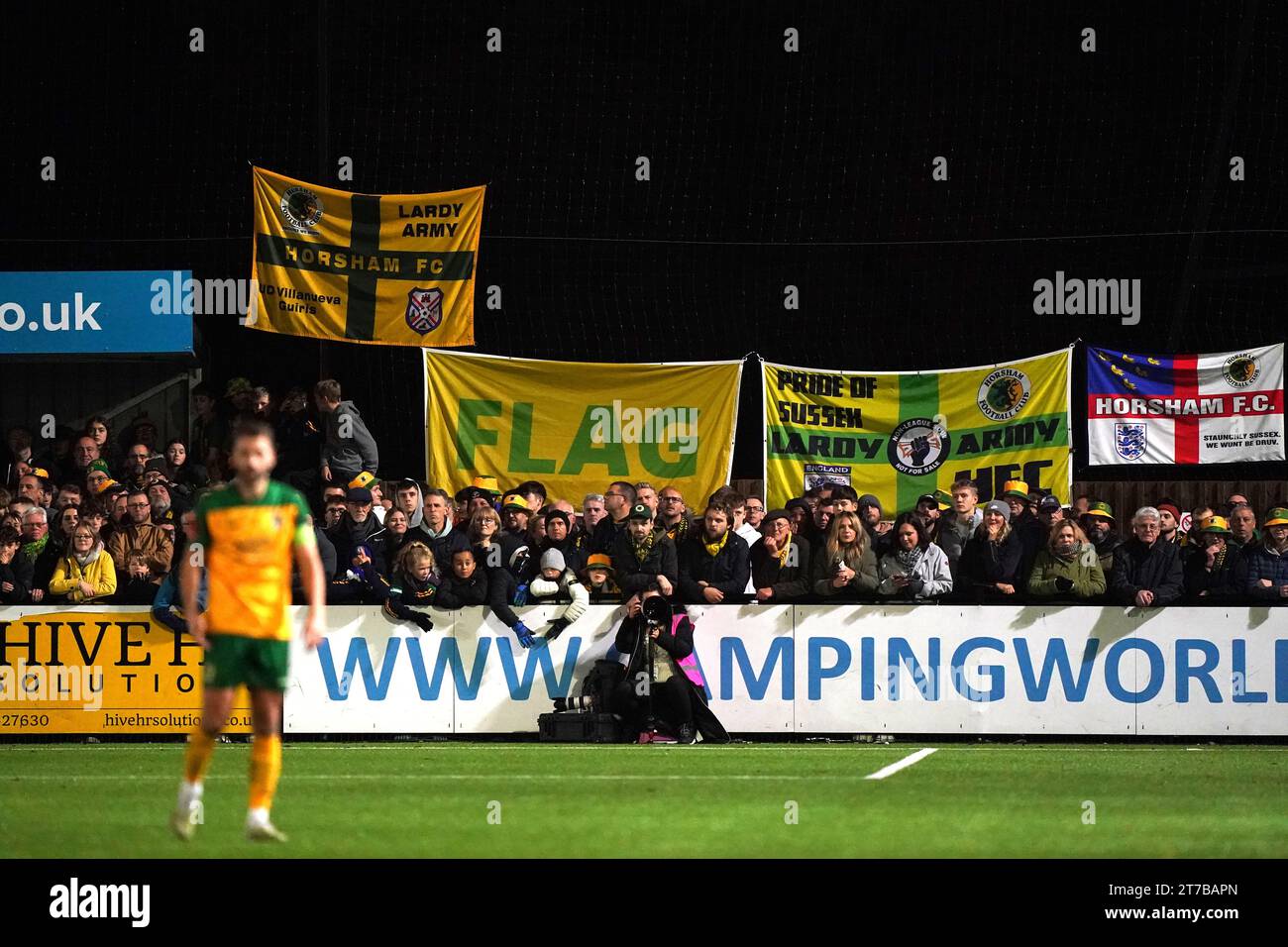 Horsham fans watch the action during the Emirates FA Cup first round replay match at The Camping World Community Stadium, Horsham. Picture date: Tuesday November 14, 2023. Stock Photo