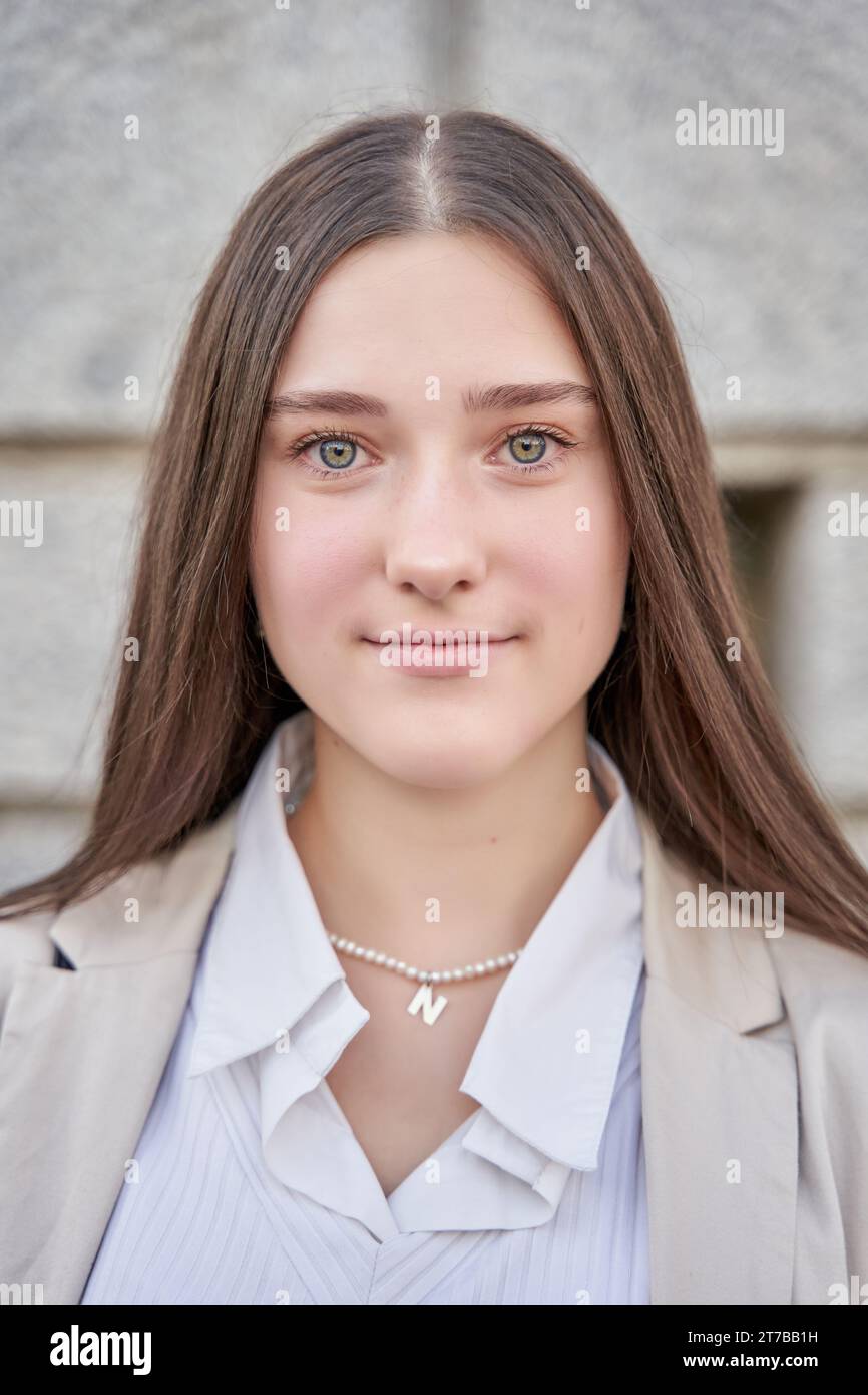 Closeup portrait of attractive, friendlylooking asian female office