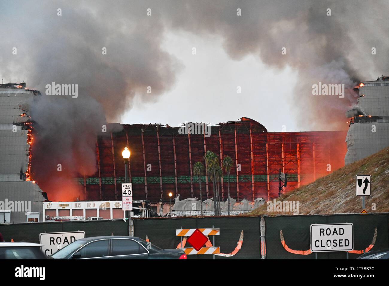 TUSTIN, CALIFORNIA - 7 NOV 2023: The Tustin MCAS Blimp Hangars fire, from Tustin Ranch Road. Stock Photo