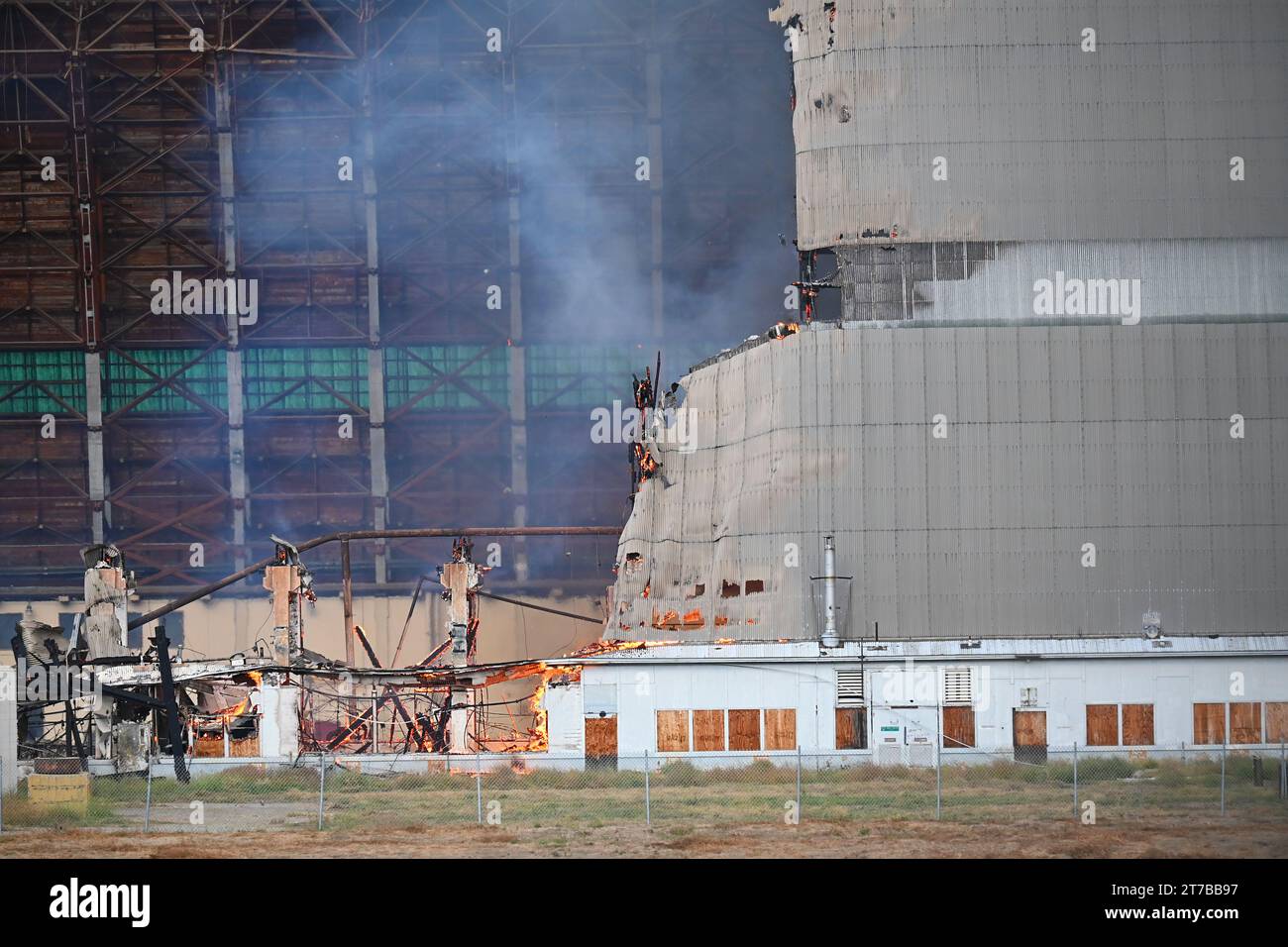 TUSTIN, CALIFORNIA - 7 NOV 2023: Closeup of the The Tustin USMCAS North Blimp Hangar fire. Stock Photo