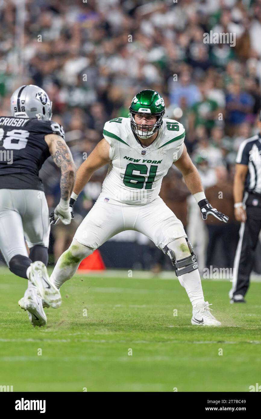 New York Jets offensive lineman Max Mitchell (61) blocks against the ...