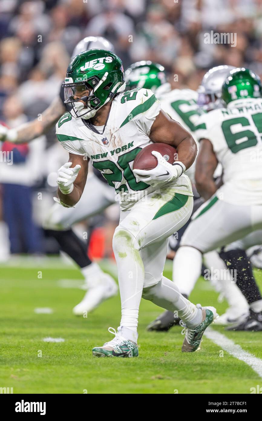 New York Jets Running Back Breece Hall (20) Runs The Ball Against The ...