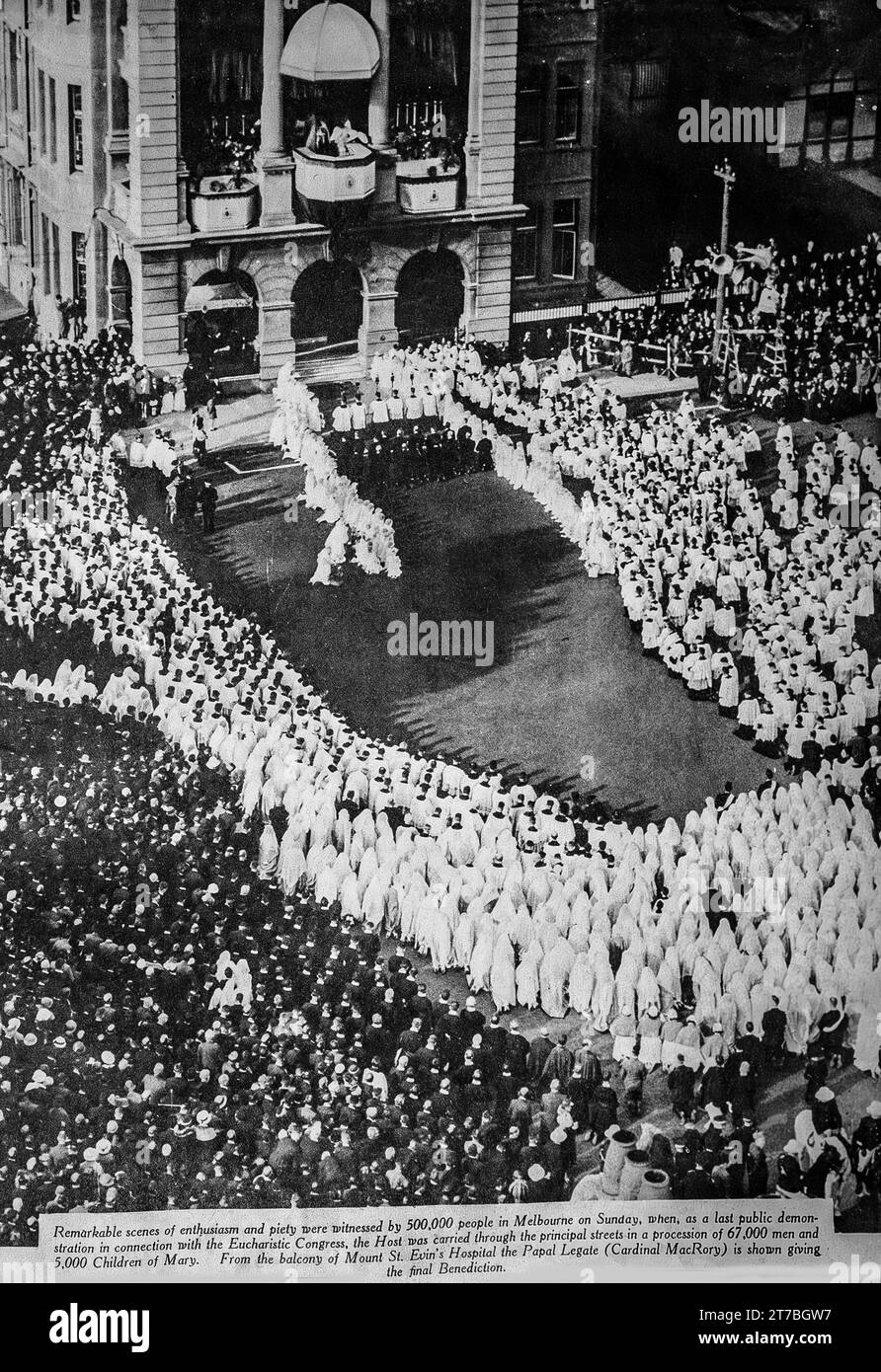 An image from the 1934 Eucharistic Congress in Melbourne, Australia. The image shows the Papal Legate, Cardinal MacRory give the final Benediction, after a procession of 67000 men and 5000 children carried The Host through the centre of Melbourne, witnessed it is said by half a million people. Stock Photo