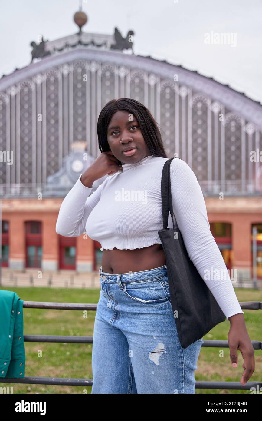 vertical portrait of an African-American woman posing Stock Photo - Alamy