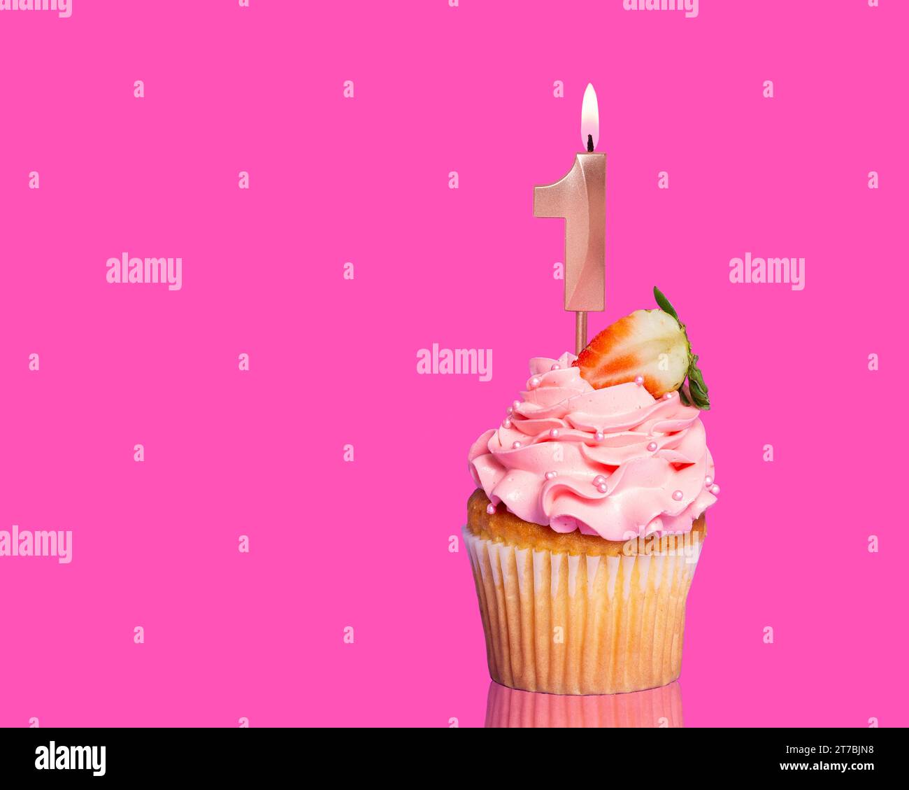 Birthday Cupcake With Candle Number 1 - On Hot Pink Background. Stock Photo