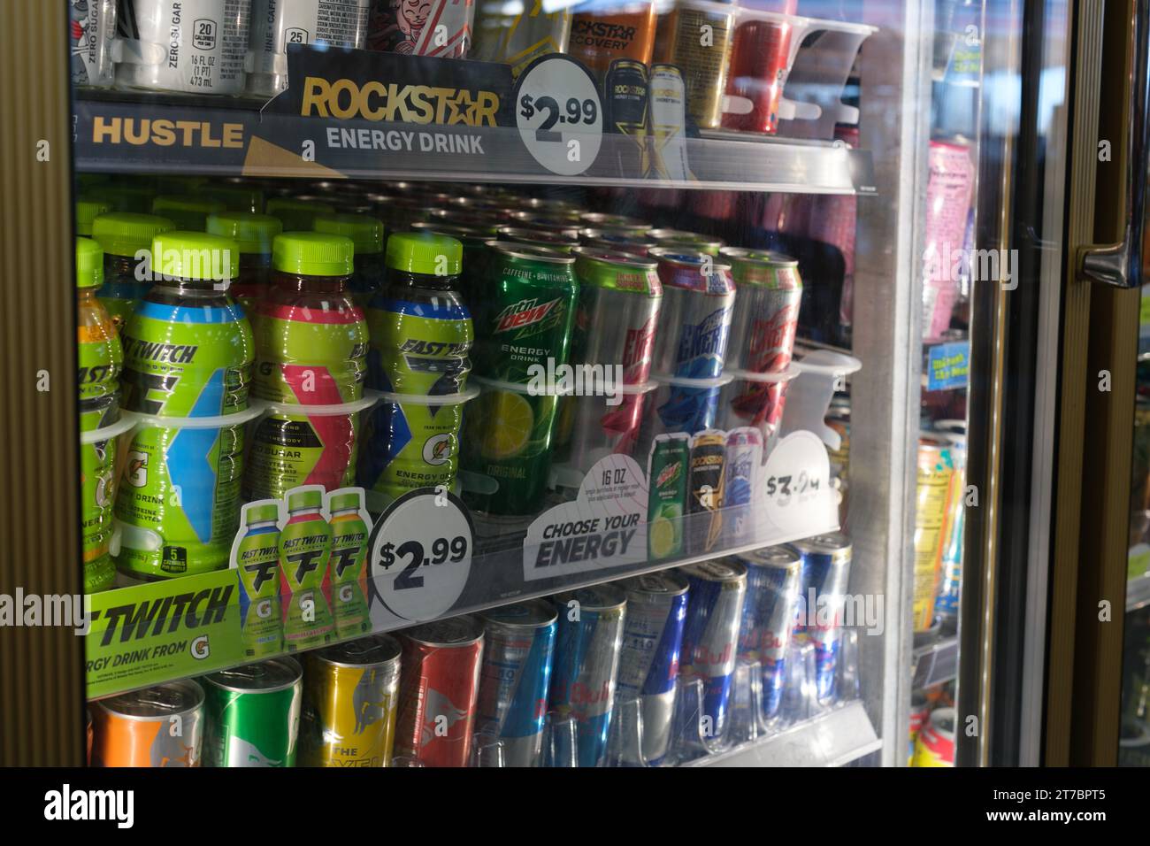 Energy drinks in a store refrigerator Stock Photo