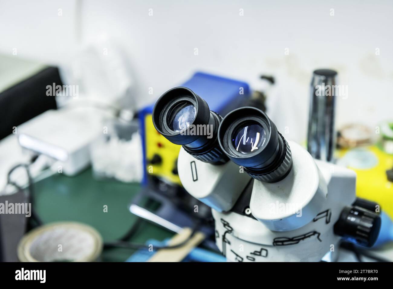 A microscope to repair mobile phones Stock Photo Alamy