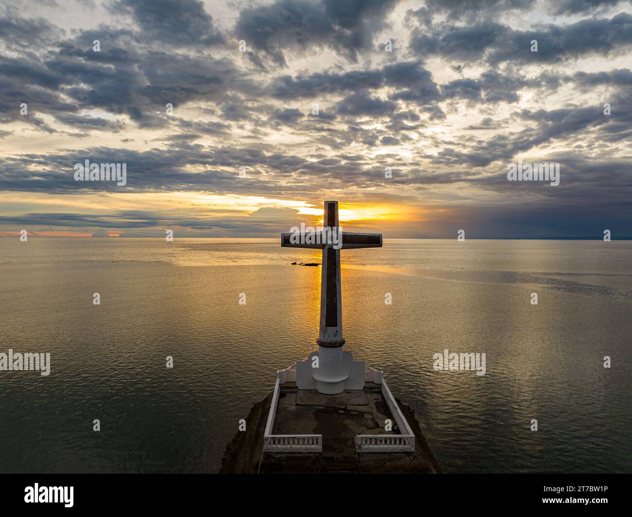 Sunken Cemetery in Camiguin Island. Cloudscape with sunset background. Philippines. Stock Photo