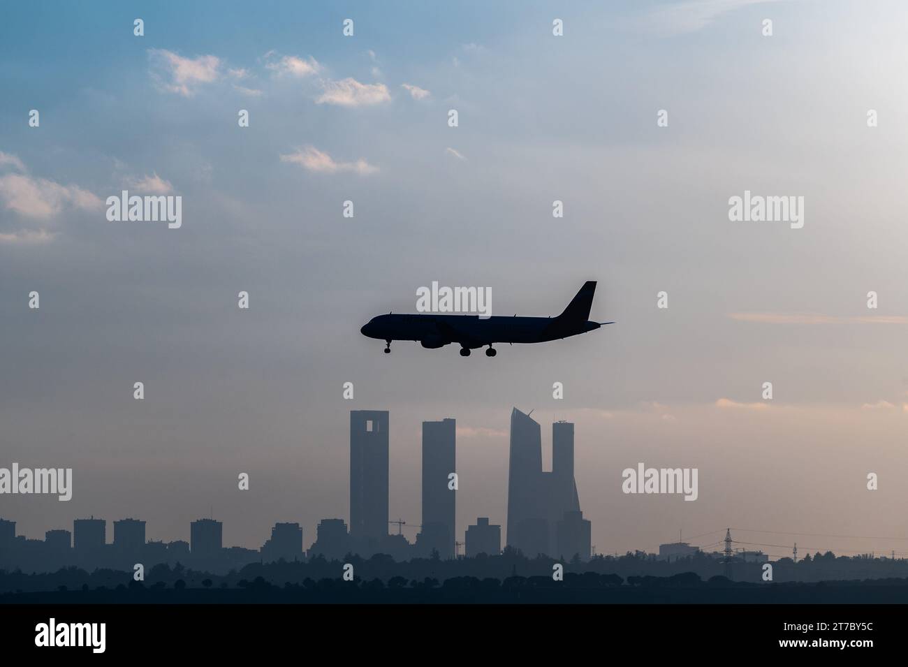 Madrid, Spain. 14th Nov, 2023. The silhouette of a commercial airplane