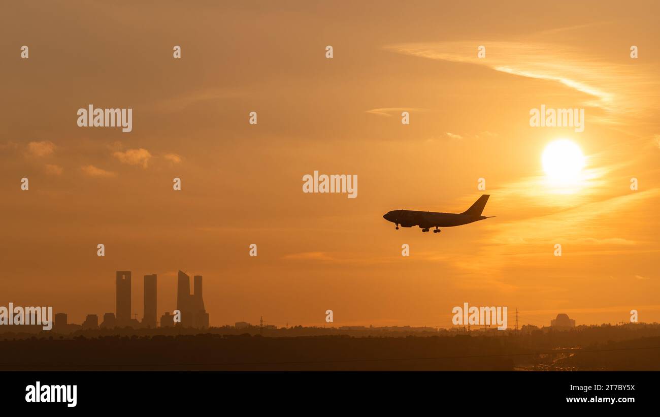 Madrid, Spain. 14th Nov, 2023. The silhouette of a commercial airplane