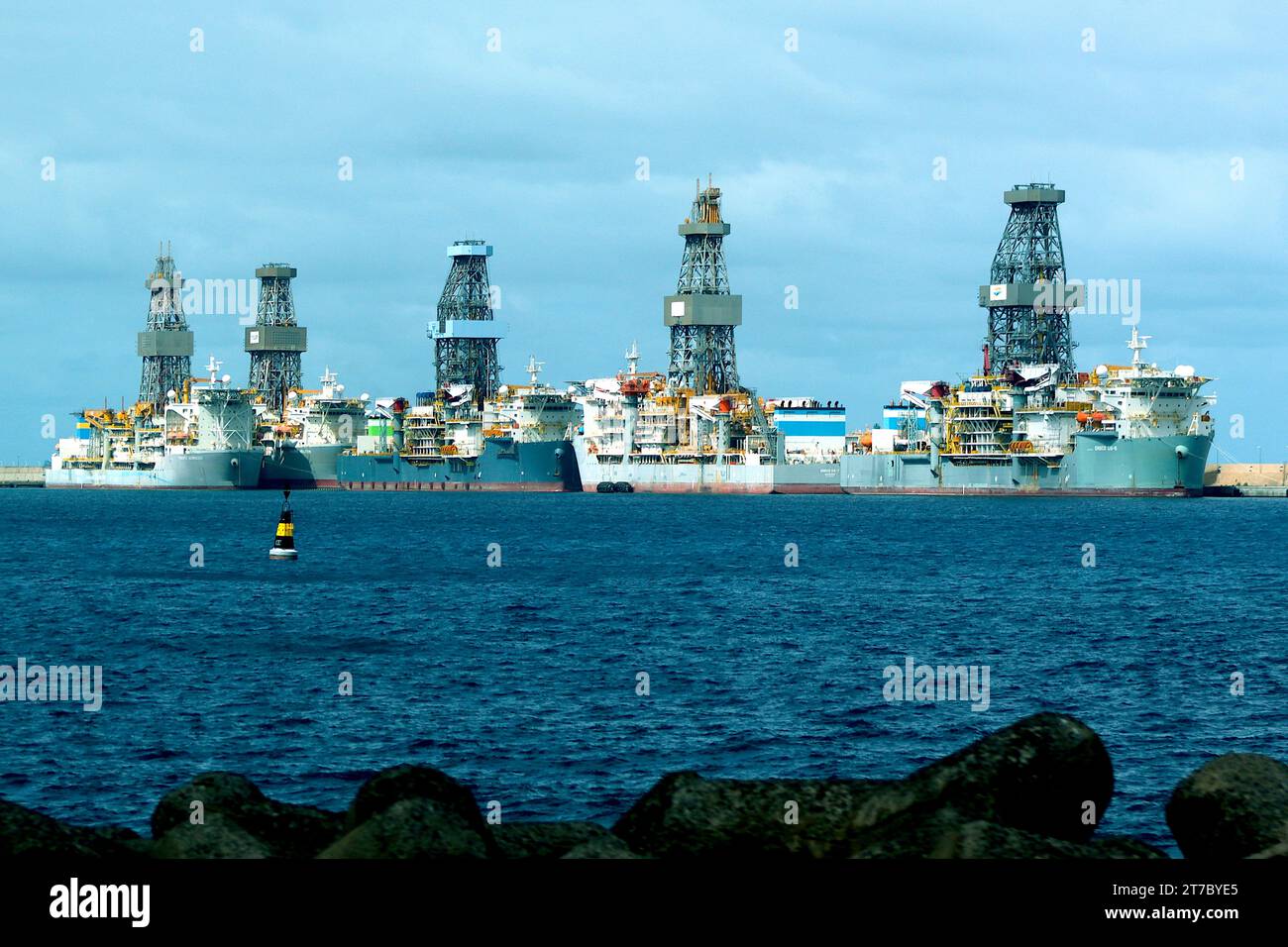 Drill ships await their next deployment at Las Palmas, Grand Canaria, L-R, Pacific Scirocco, Pacific Meltem, Valaris  DS-9, Ensco DS-7, Ensco DS-8. Stock Photo