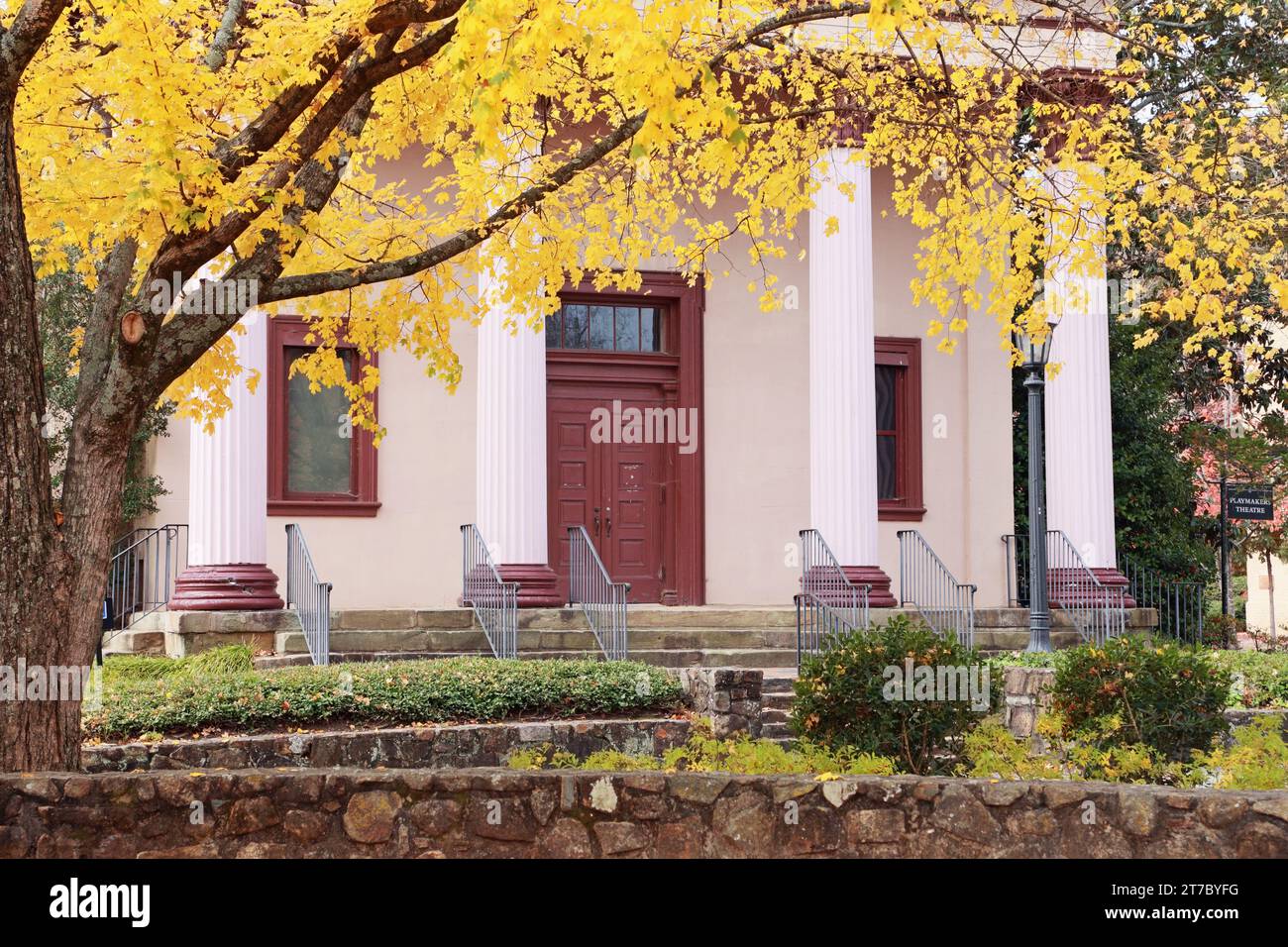 Playmakers theatre at University of North Carolina at Chapel Hill framed in yellow autumn leaves. Built in 1850.Greek Revival architecture. Landmark Stock Photo