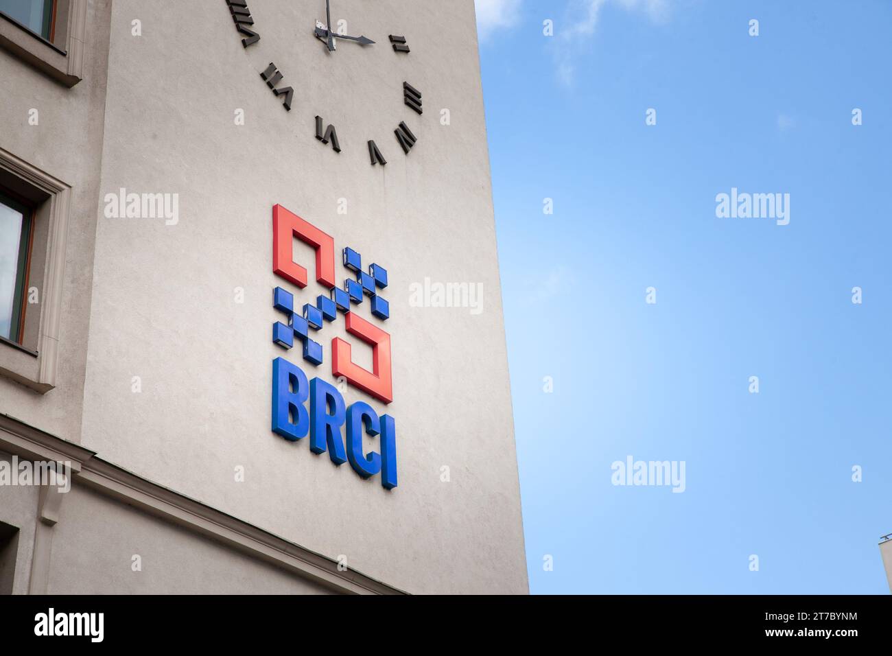 Picture of a sign with the logo of Banca Romana De Credite Si Investitii Bank bank in Bucharest, Romania. Banca Romana De Credite Si Investitii Bank, Stock Photo