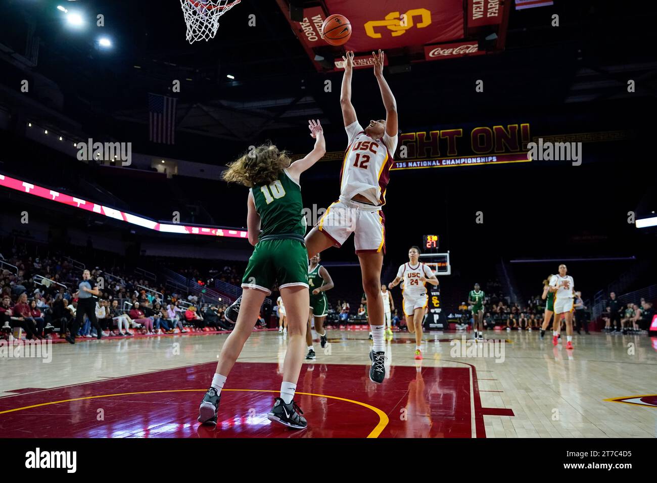 Southern California guard JuJu Watkins (12) shoots against Le Moyne guard Sydney Lusher (10