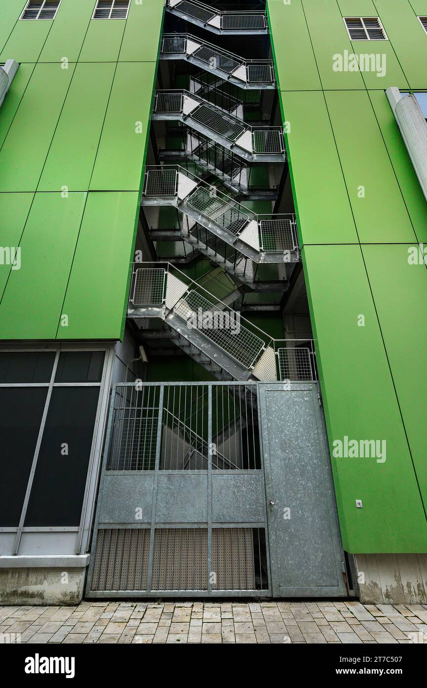 Green facade with external metal staircase in Kempten, Allgaeu, Bavaria, Germany Stock Photo