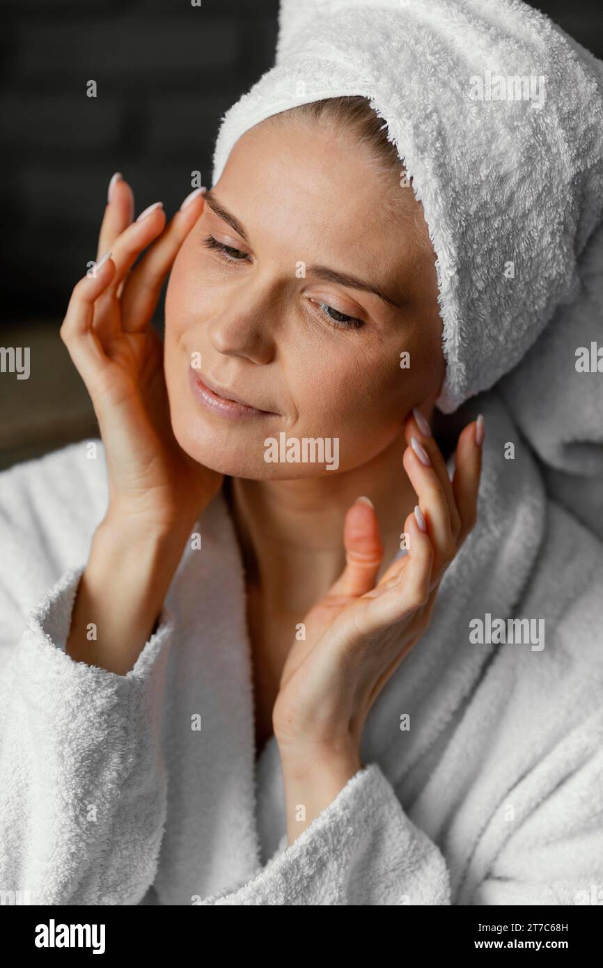 Close up woman with towel head Stock Photo