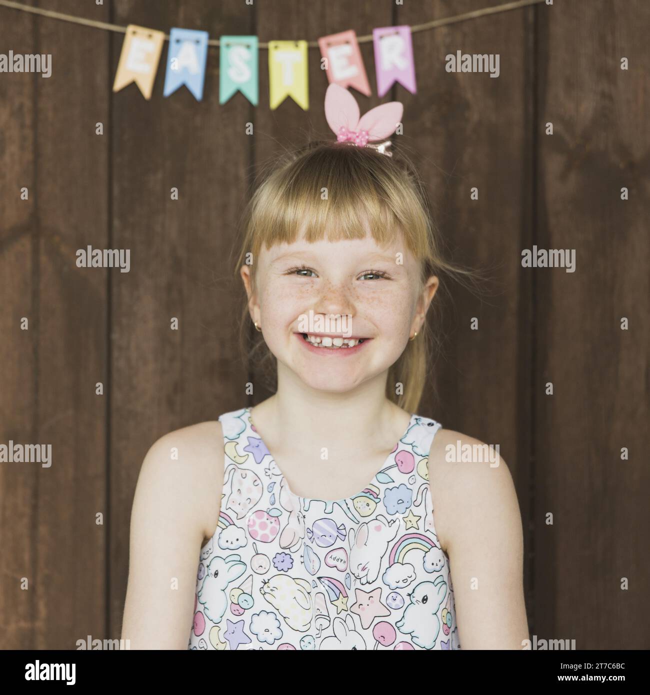 Content little girl easter Stock Photo