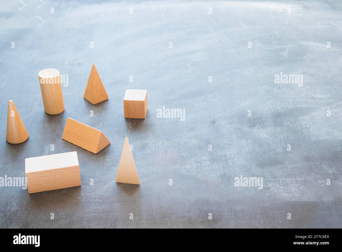 Desktop with wooden geometrical shapes Stock Photo