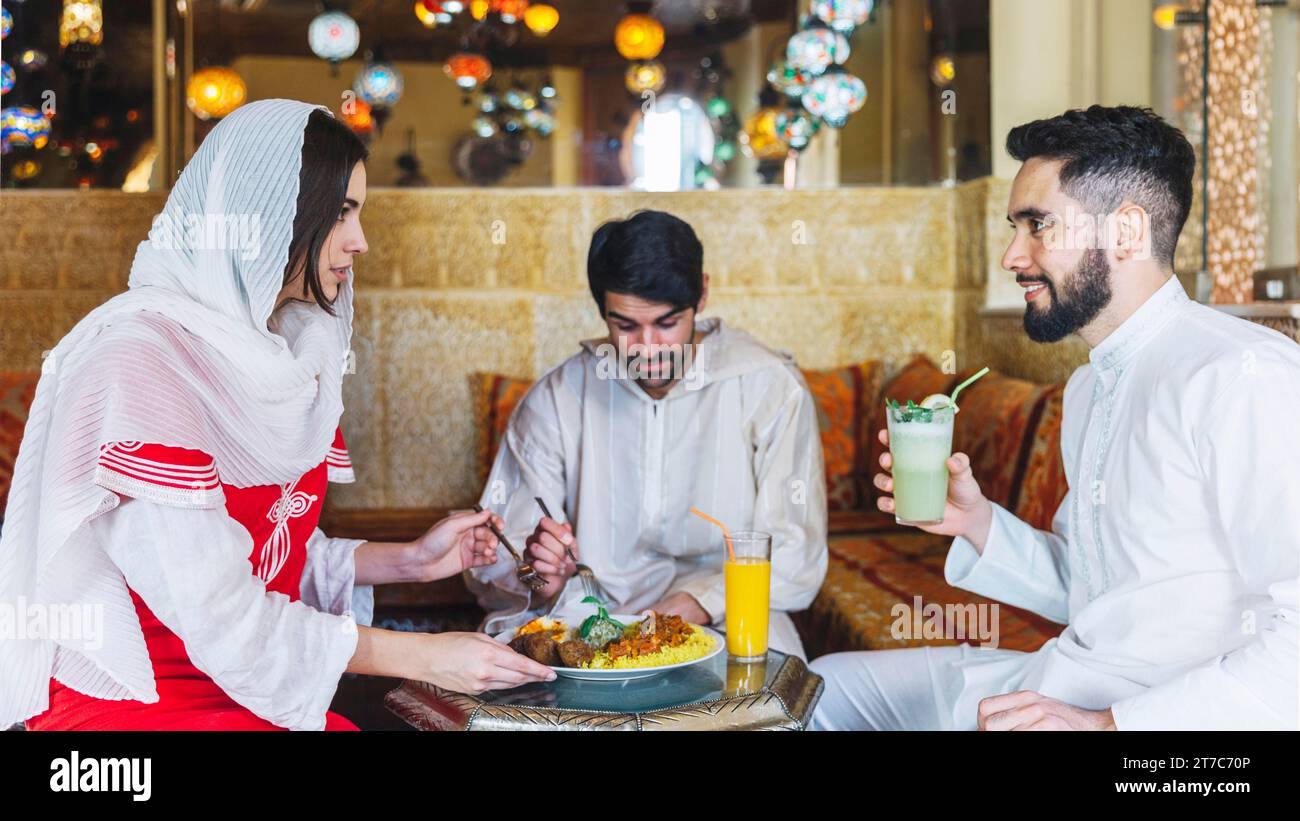 Group friends arab restaurant Stock Photo