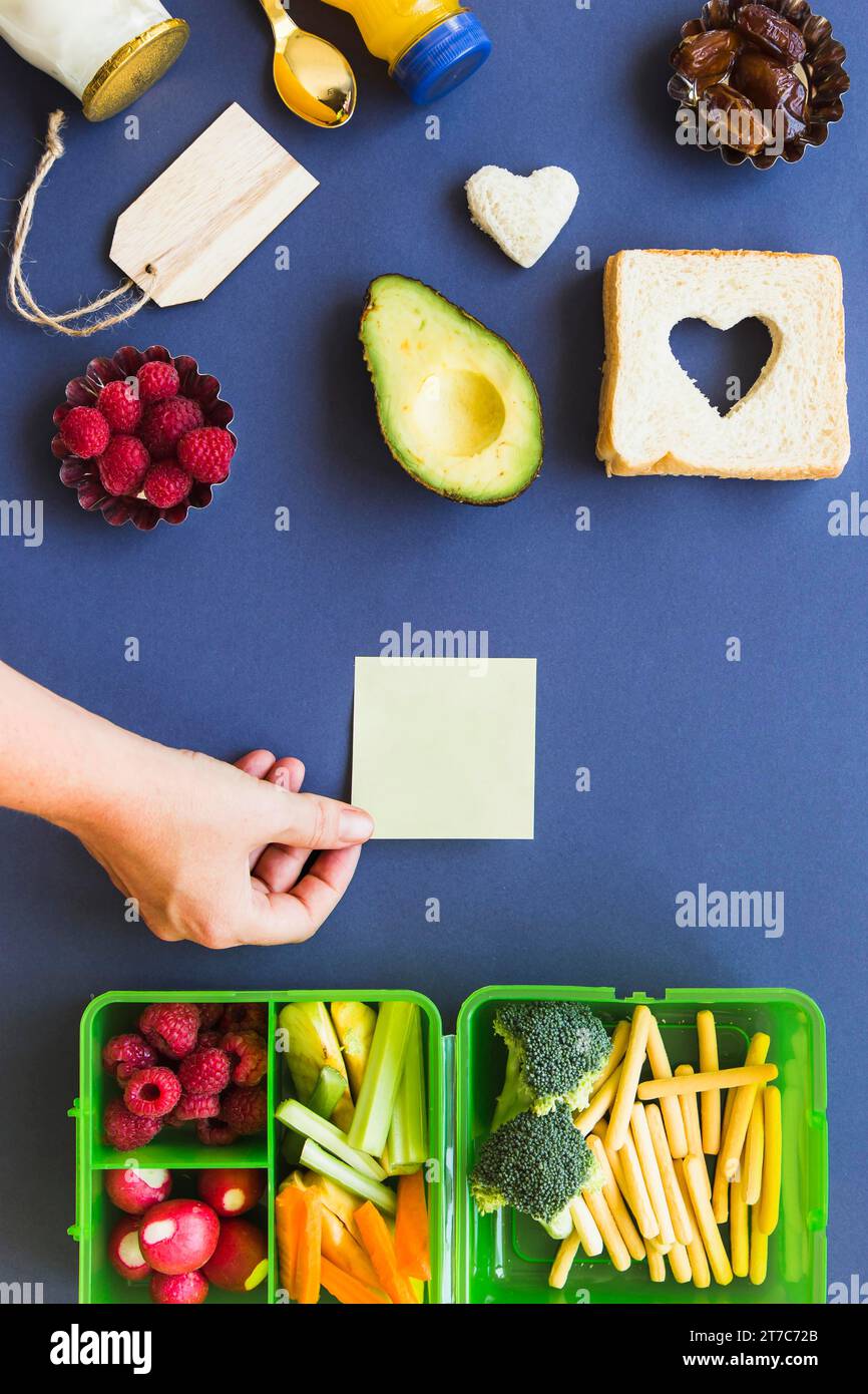 Hand putting sticker table with ingredients Stock Photo