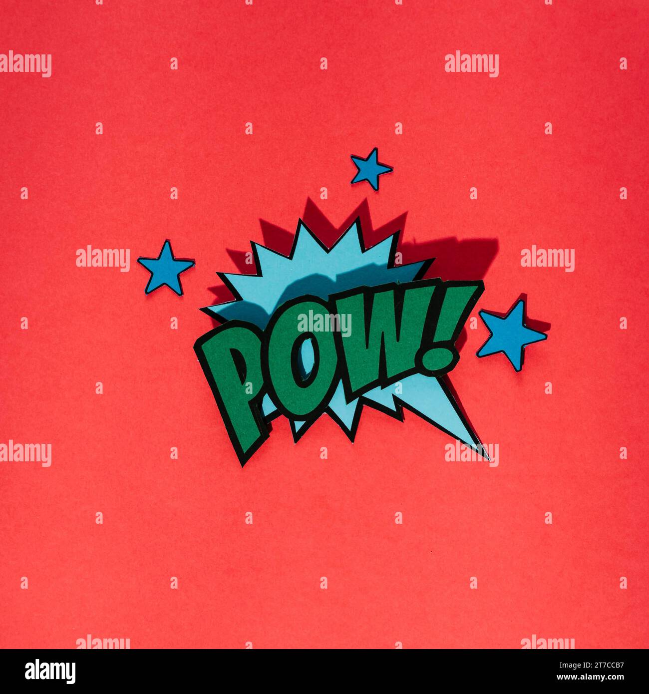Stylish retro comic speech bubble with pow text with star elements red background Stock Photo