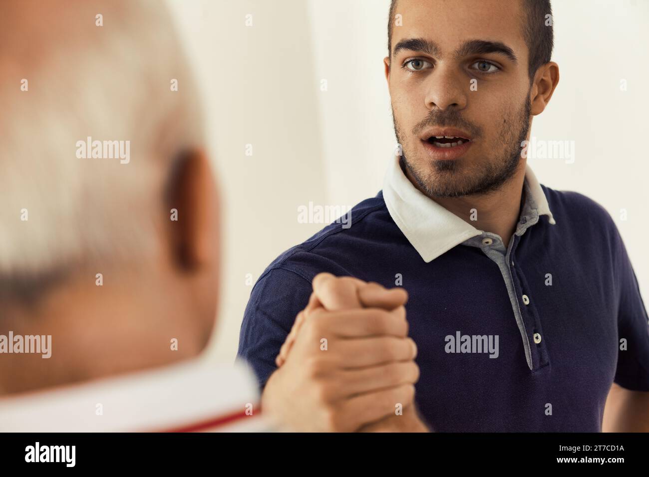 Arm wrestled handshake hires stock photography and images Alamy