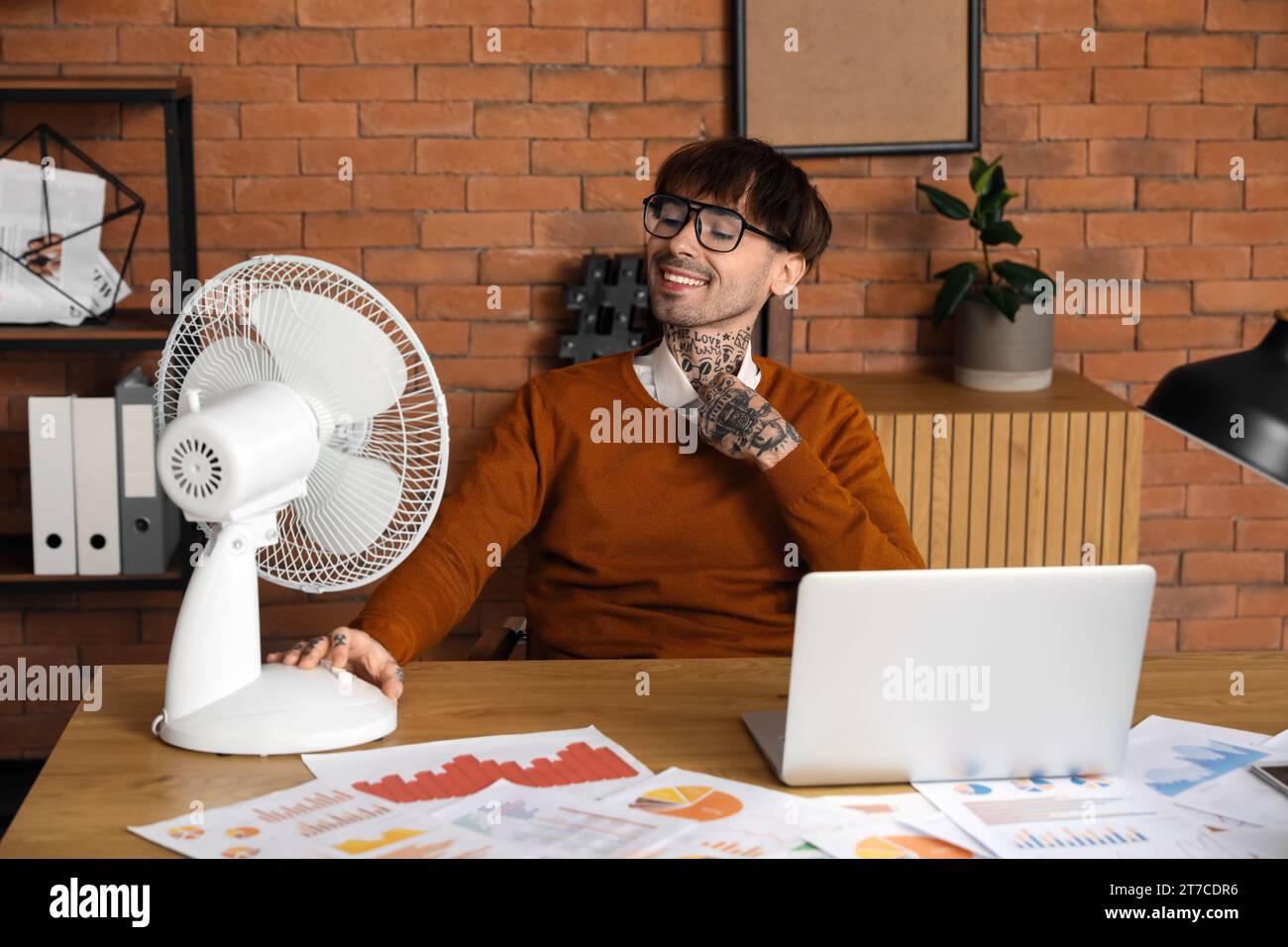 Fan spinning man hi-res stock photography and images - Alamy