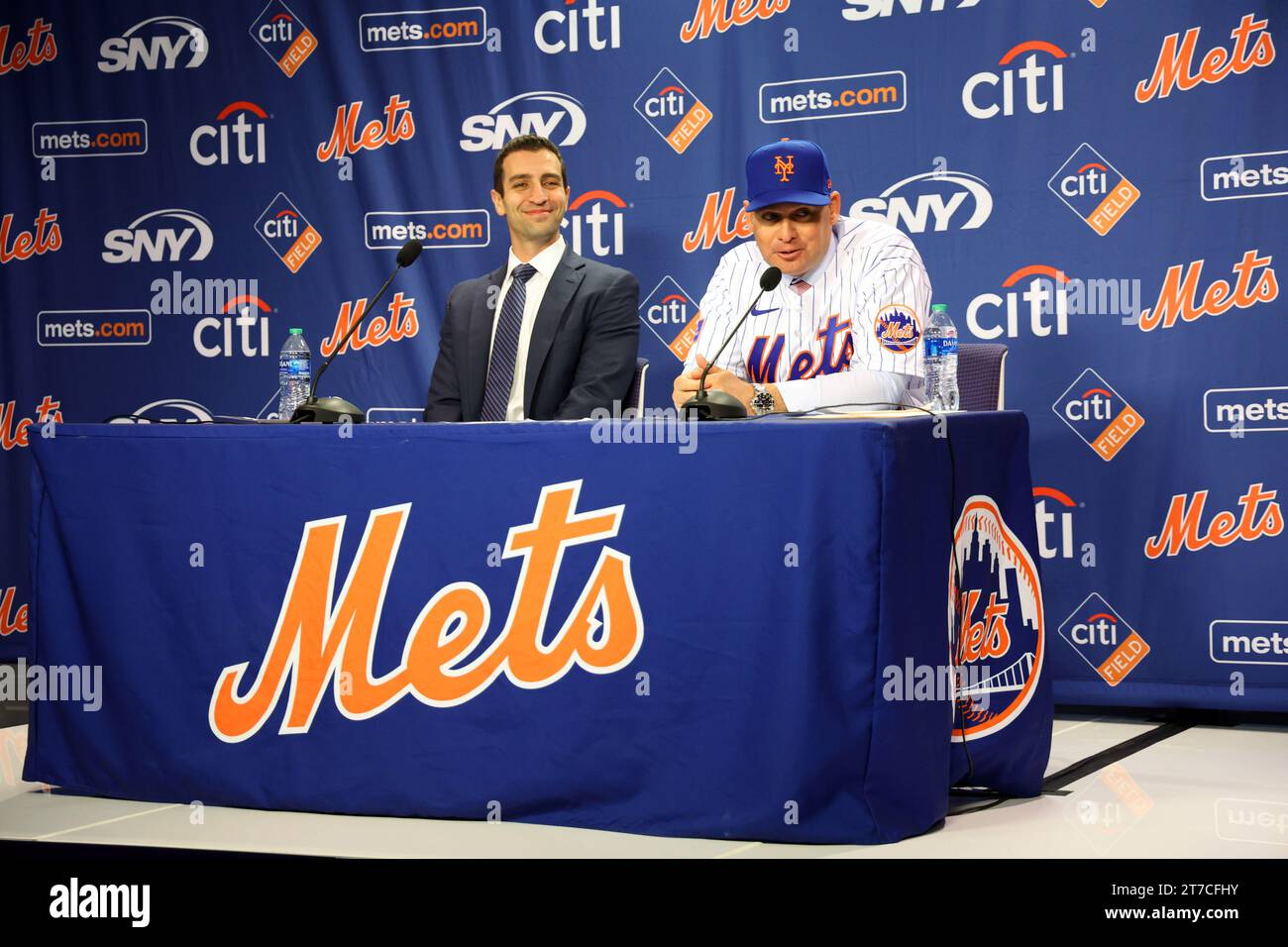 New York Mets President of Baseball Operations David Stearns introduces new Mets manager Carlos Mendoza poses for photos after a press conference at Citi Field in Corona, New York, Tuesday, Nov. 14, 2023. Mendoza is the 25th manager in team history, agreeing to terms on a three-year contract with a club option for a fourth year.  (Photo: Gordon Donovan) Stock Photo