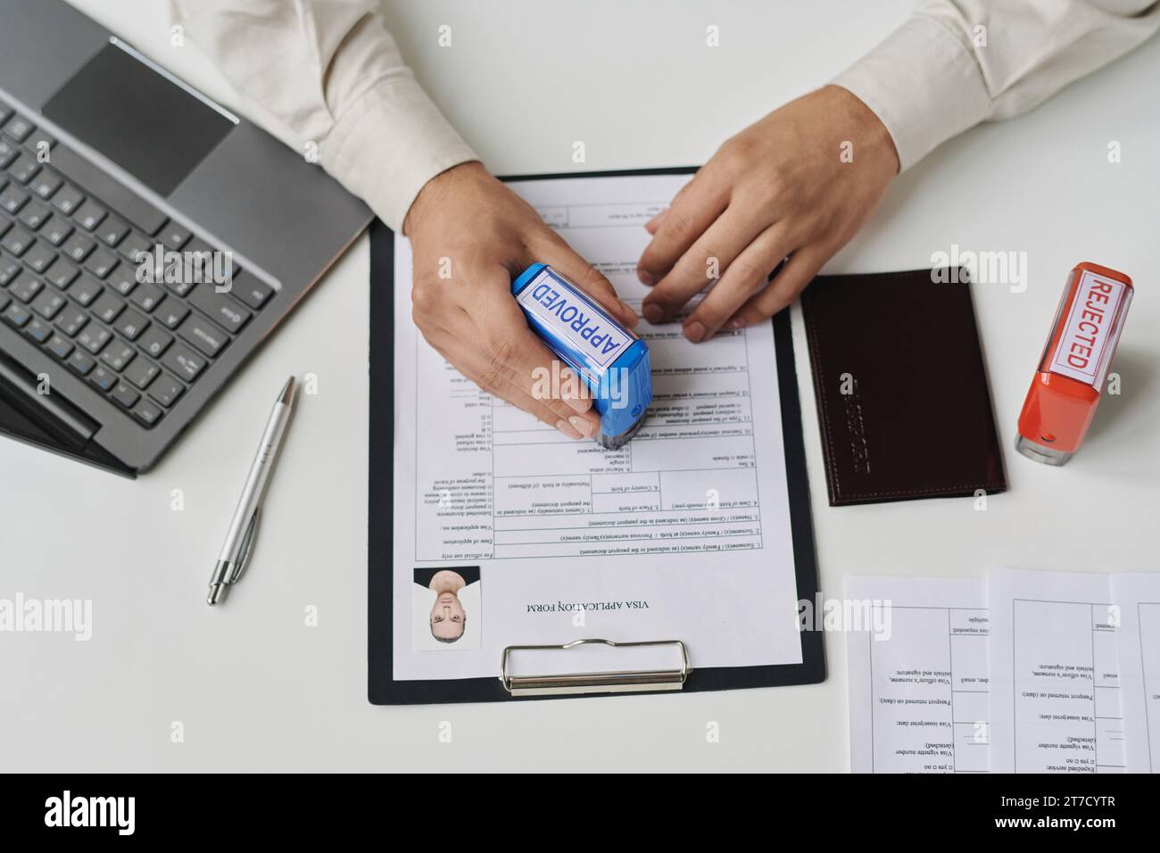 Approving visa application passport hi-res stock photography and images ...