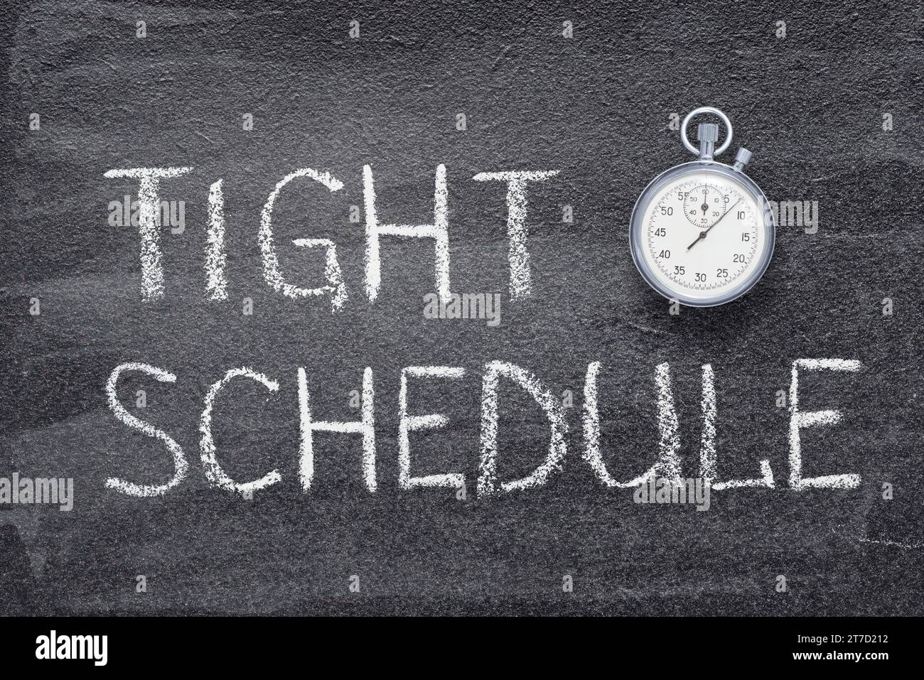 tight schedule phrase written on chalkboard with vintage precise