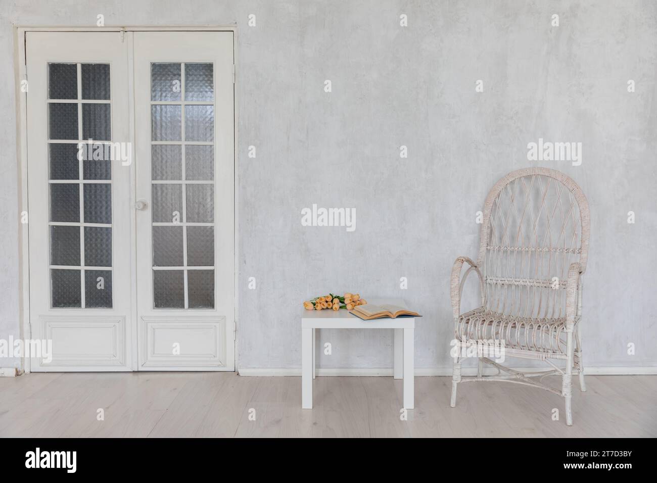 White vintage armchair and coffee table in room interior Stock Photo ...